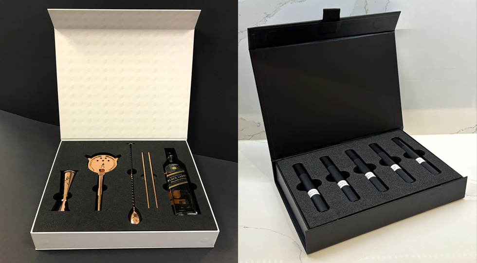 Image showing 2 boxes one with a bottle of whisky and some accessories and the other one with cigars